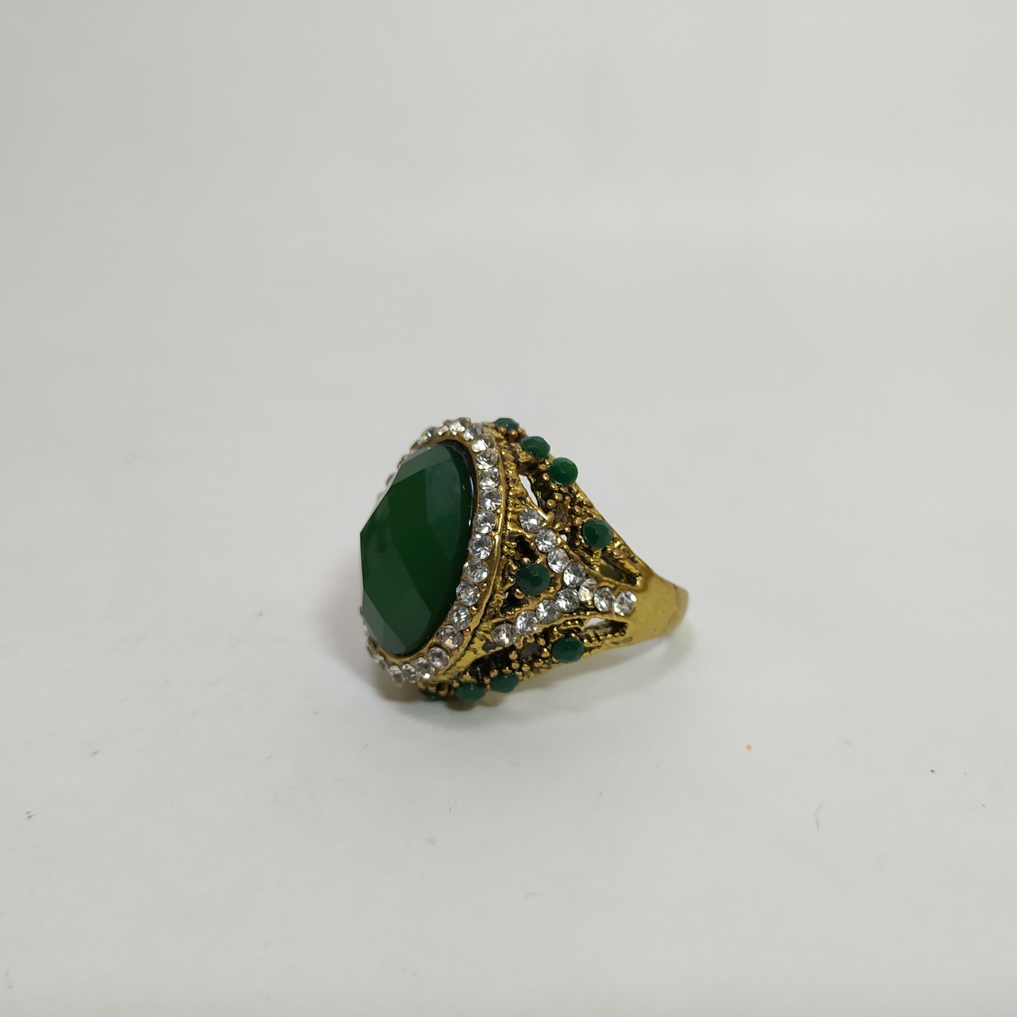 Green Stone Victoria Ring. Artificial diamond zirconia work / Gold-plated brass/alloy ring for Girls and Boys.