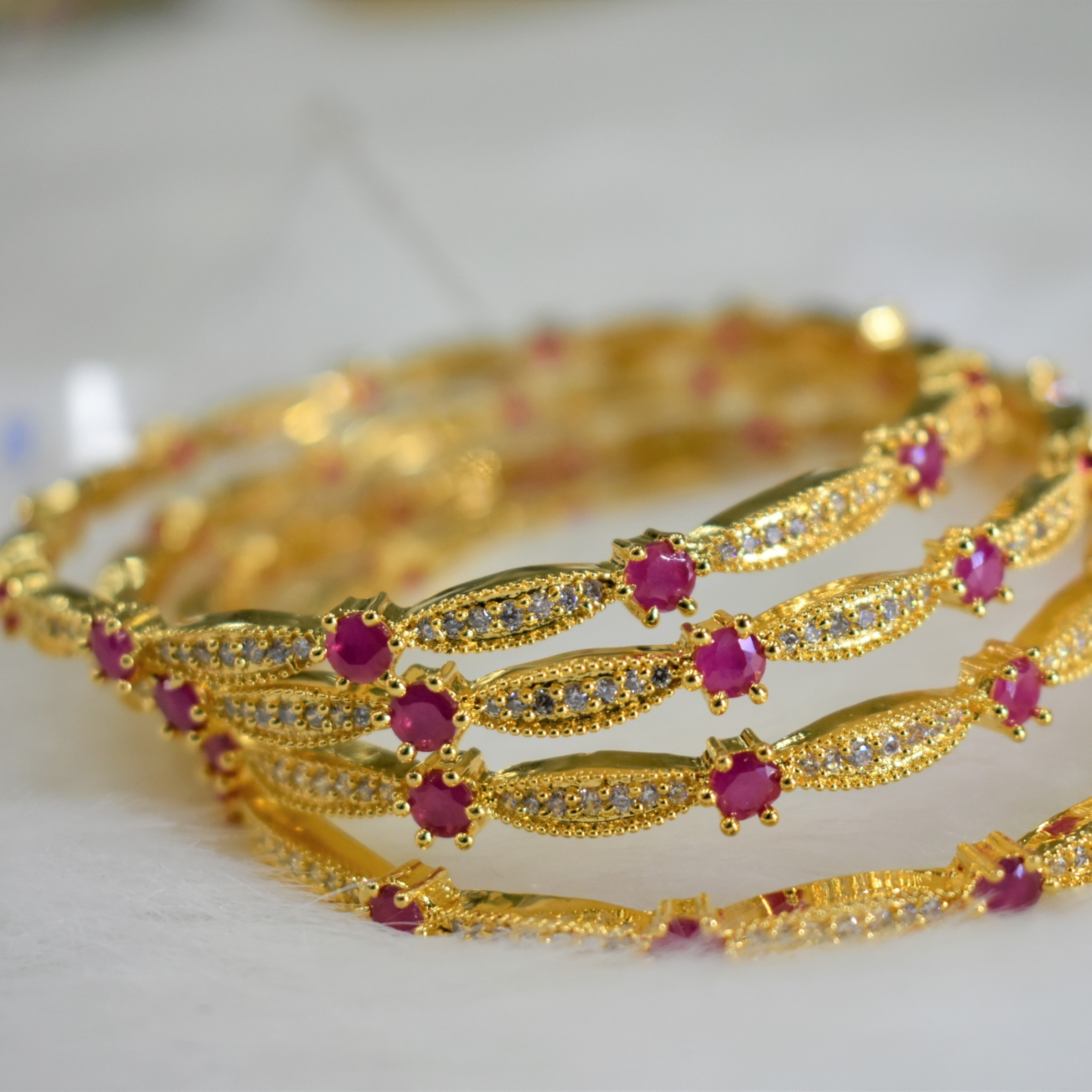 CZ Bangles (4No) white and ruby stones size 2-8