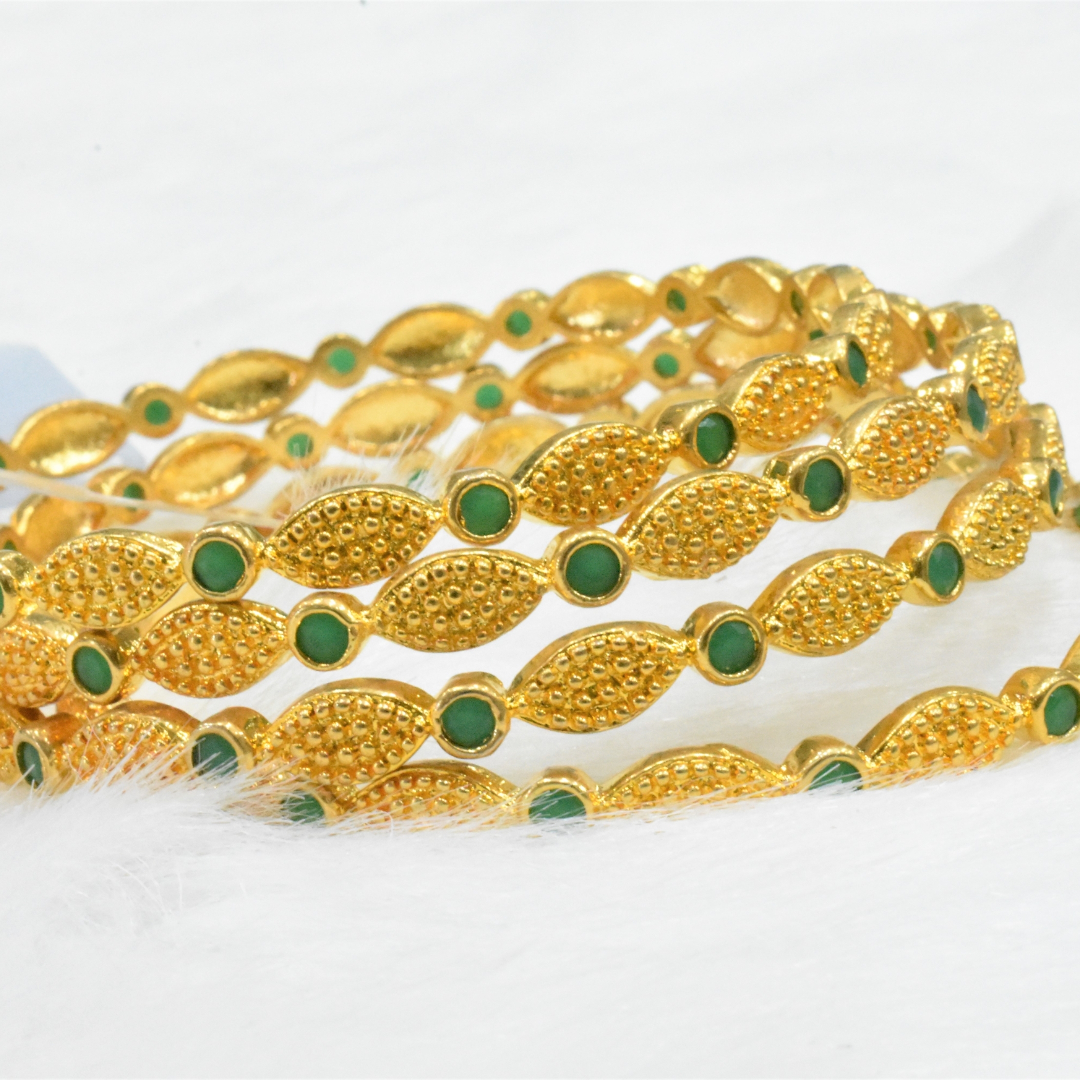  CZ Bangles (4No) Gold and Emerald Green stones Size 2-6