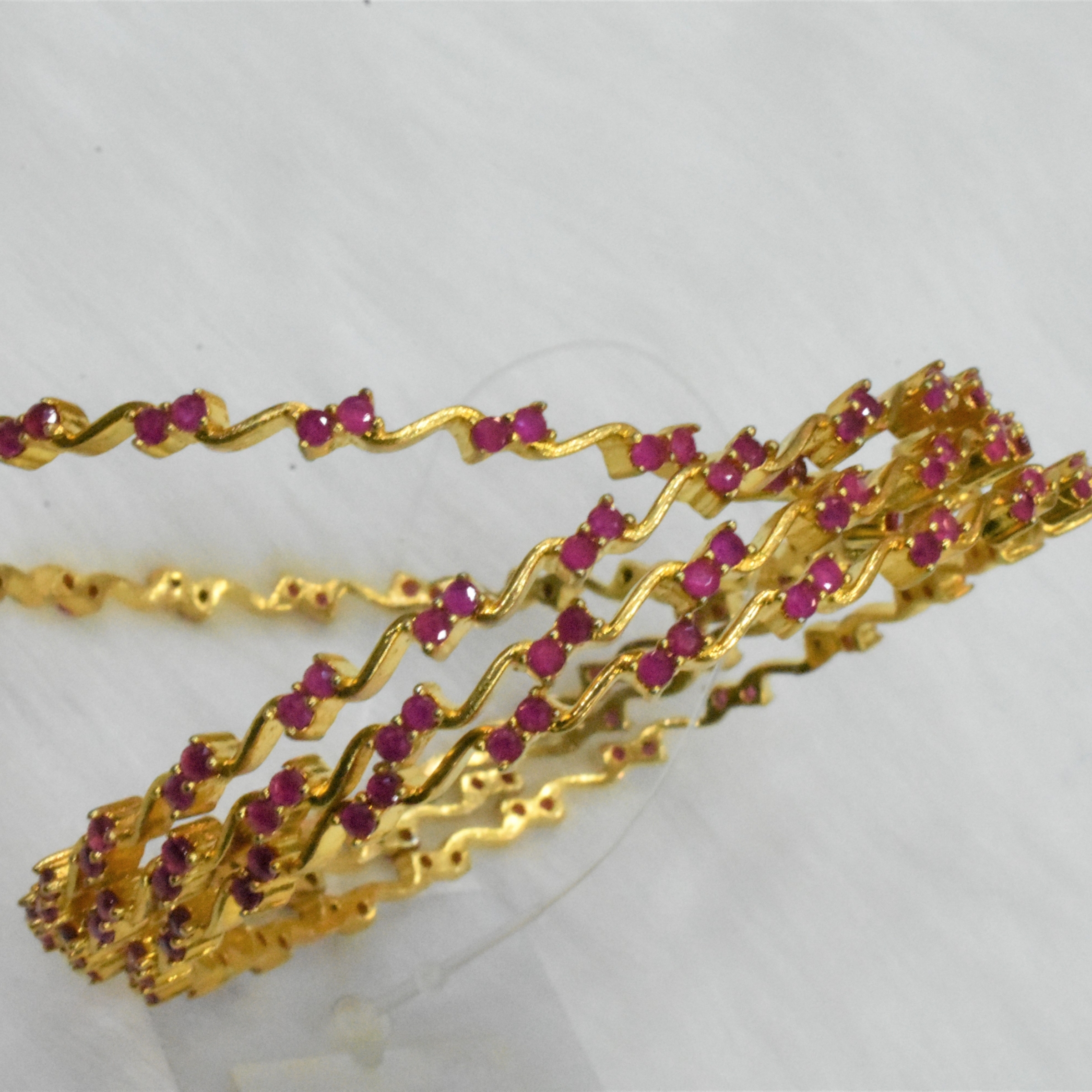 CZ Bangles (4No) Ruby Red Stones side by side Size 2-6