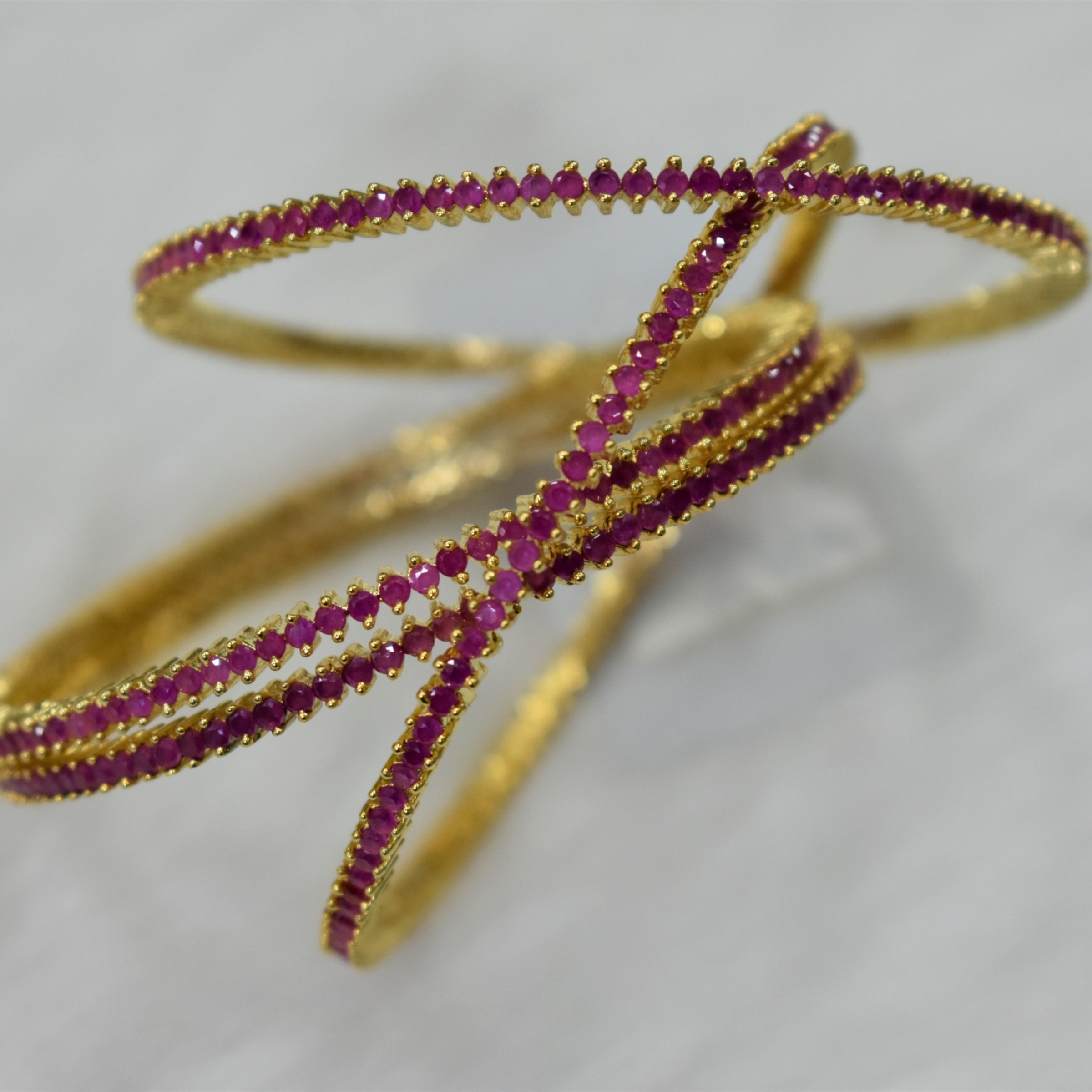 CZ Bangles (4No) Ruby Red Stones Size 2-6