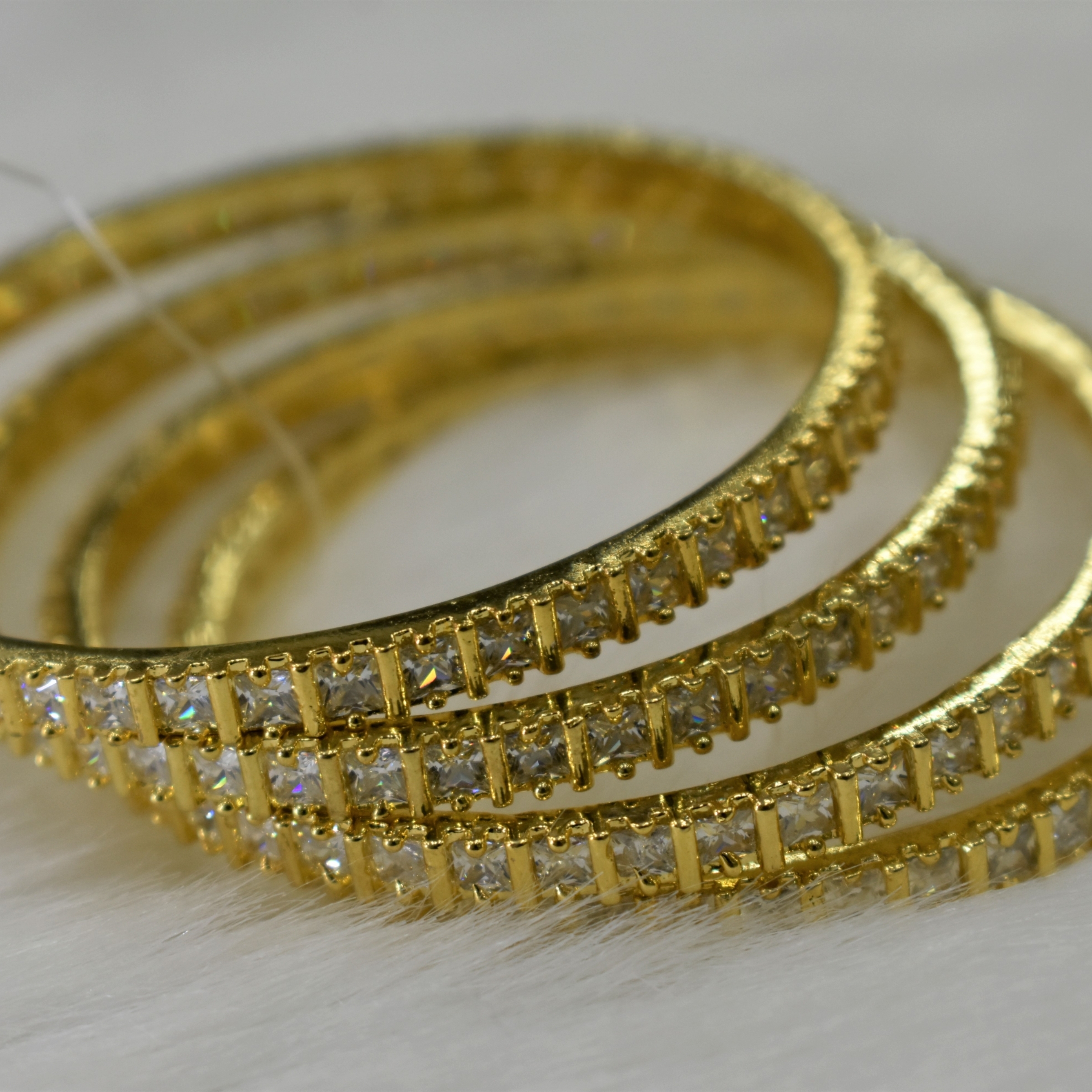 CZ Bangles (4No) white stones Size 2-4