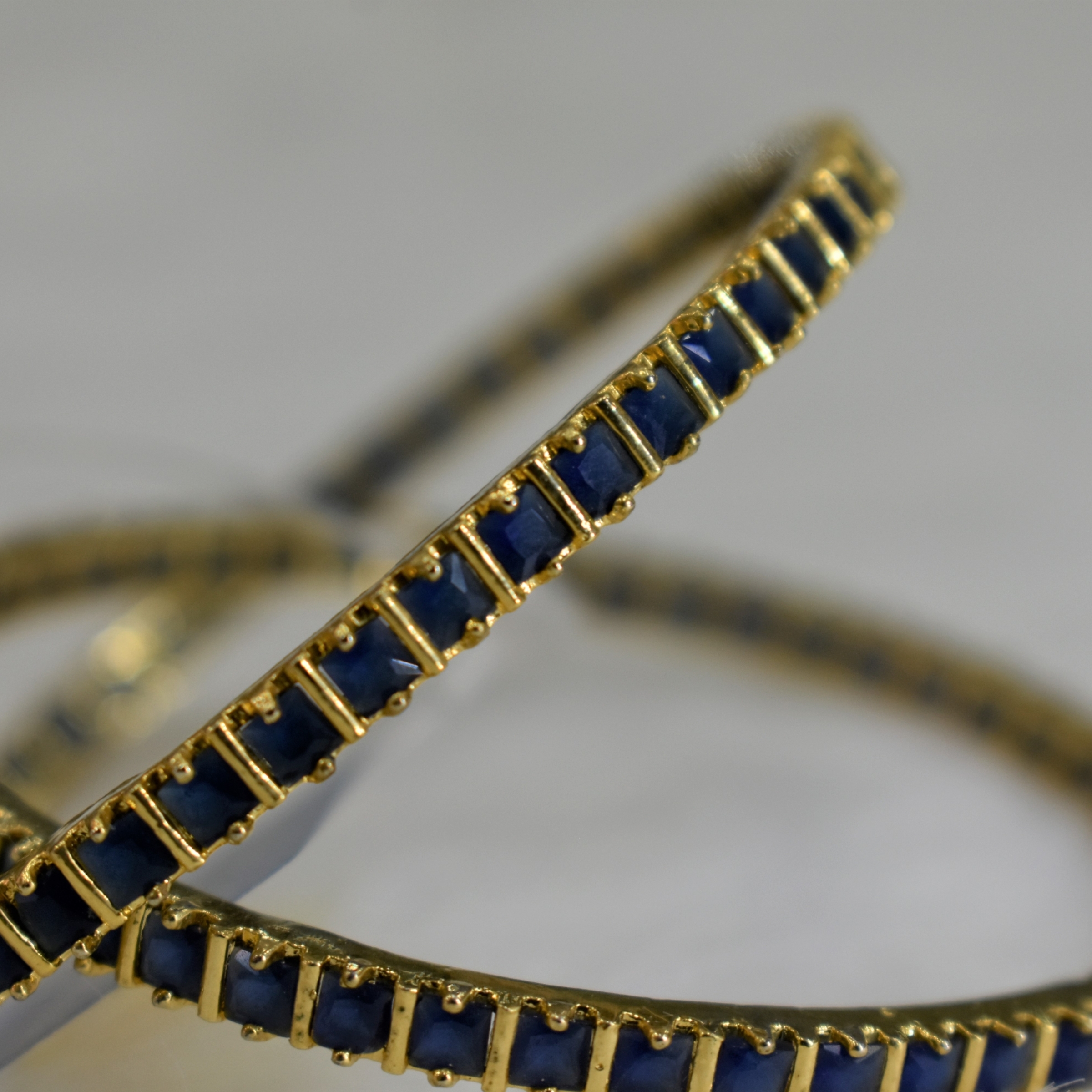 CZ Bangles (2No) Blue Stones Size 2-6