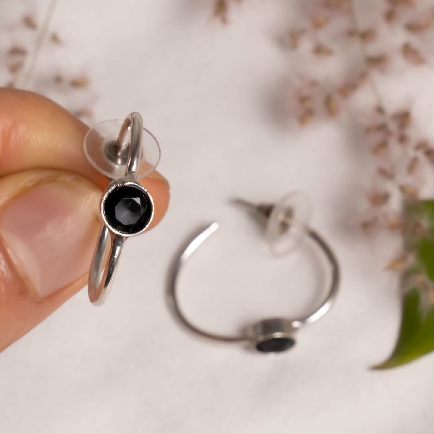 Black stone round earrings