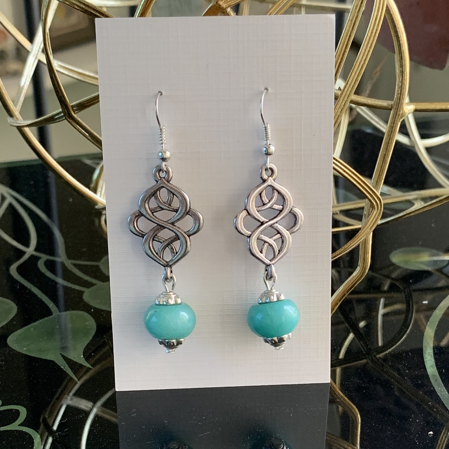 Celtic knot - Teal with caps
