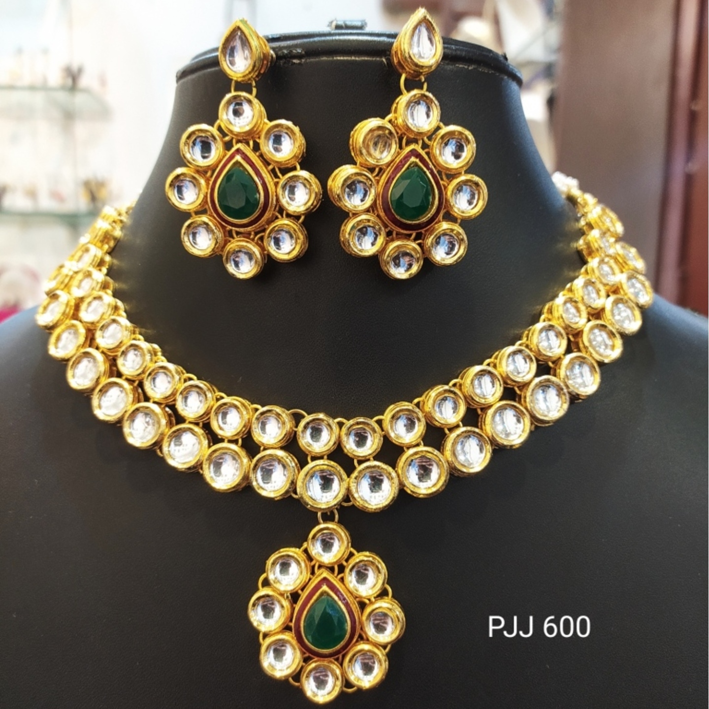 Kundan Necklace Set with Green Stone