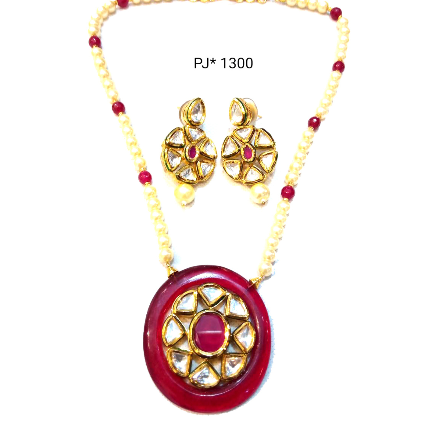 Kundan Meena Ruby Pendant Set in Pearl Beads