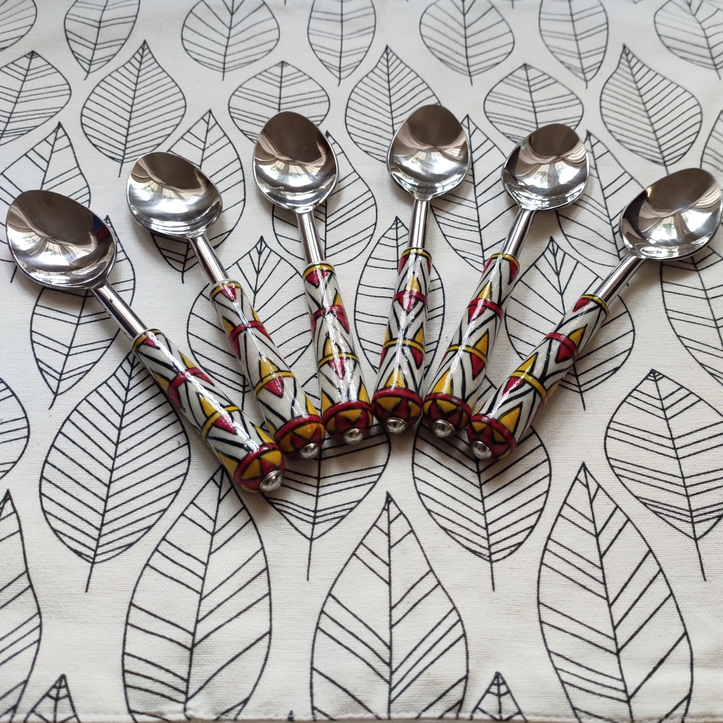 Ceramic Temple Design Red and Yellow Spoons