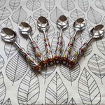 Ceramic Temple Design Red and Yellow Spoons