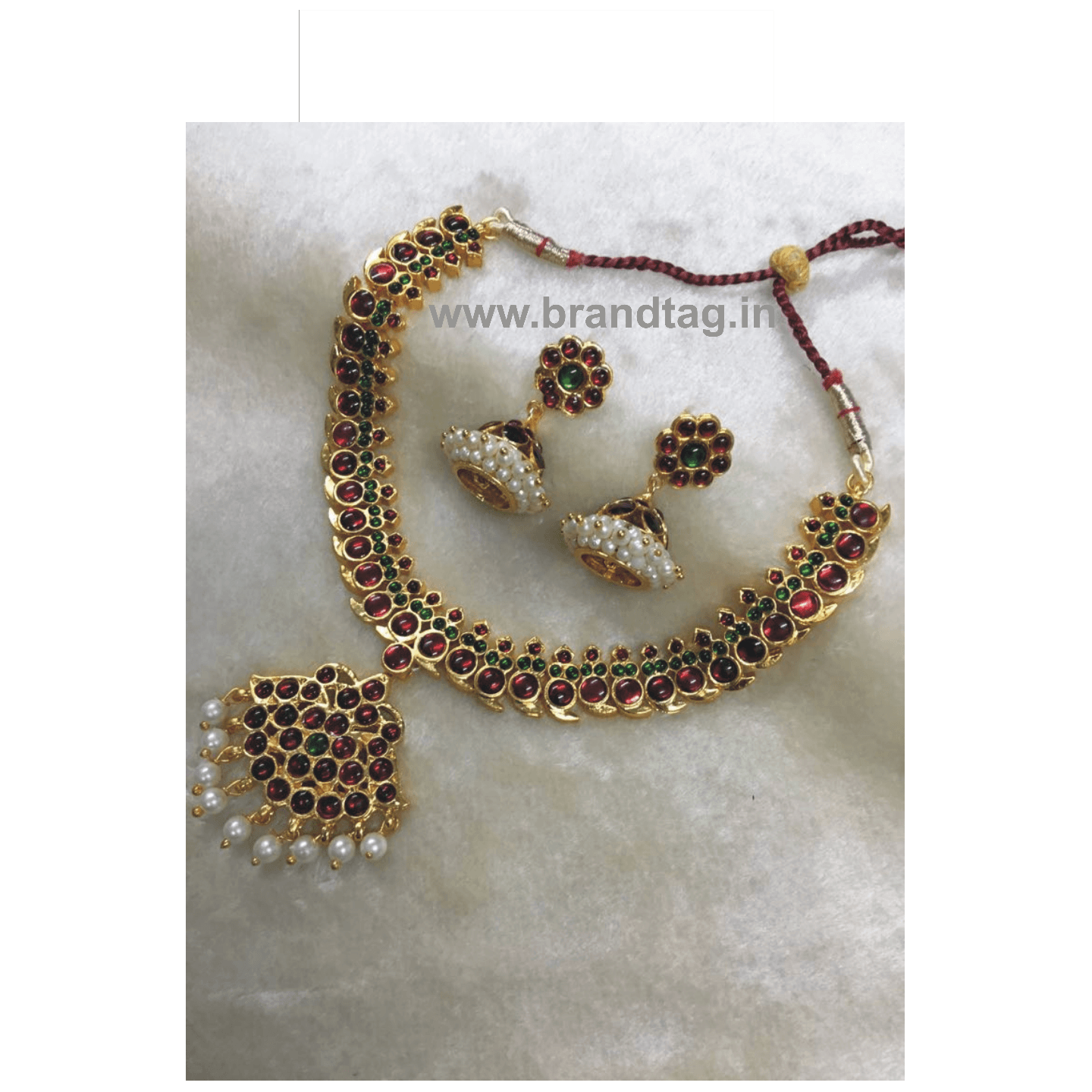 Beautifully Designed Red Stone Golden Necklace set for women ! 