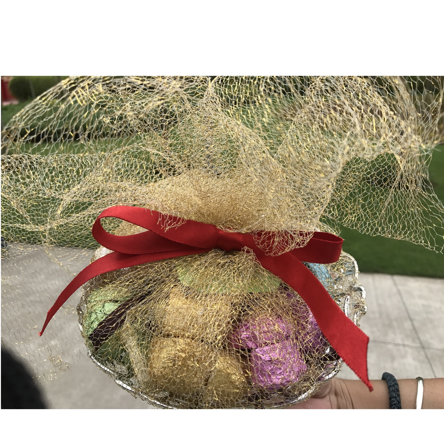 Golden basket of chocolates