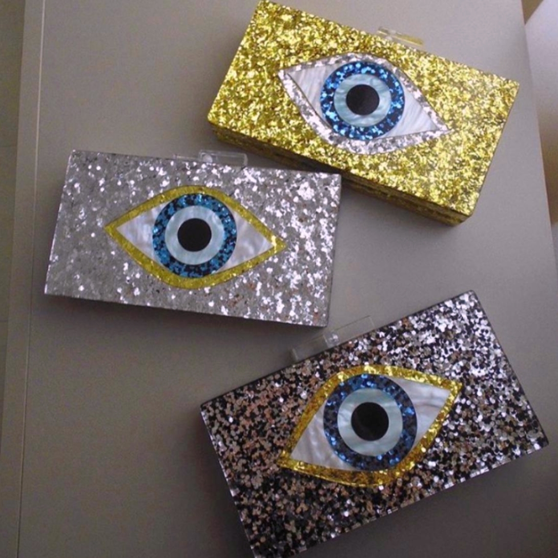 partywere designer resion clutch 