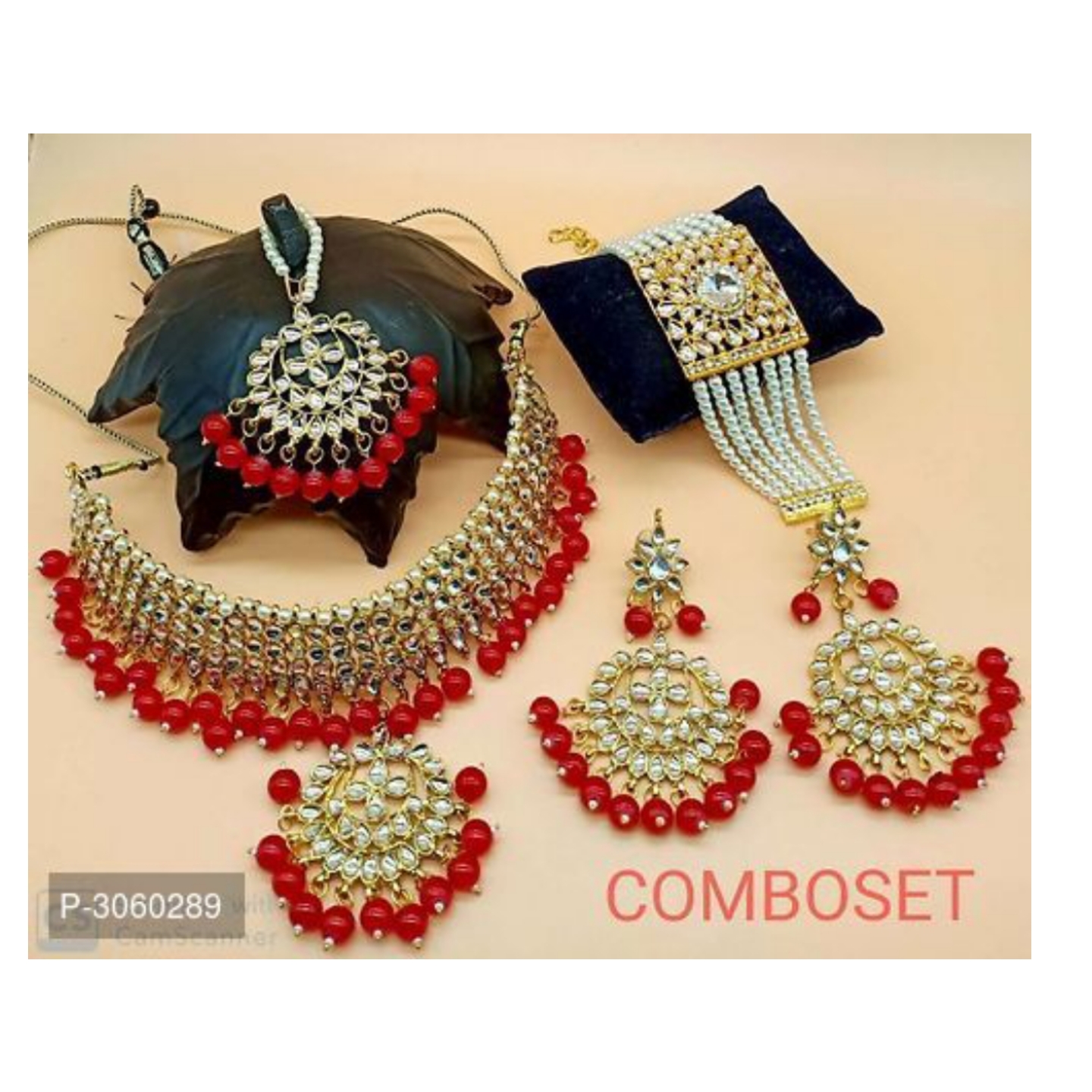 Designer Pearl Kundan Jewellery Combo Including Pair Of Earring and Maang Tikka and Bracelet