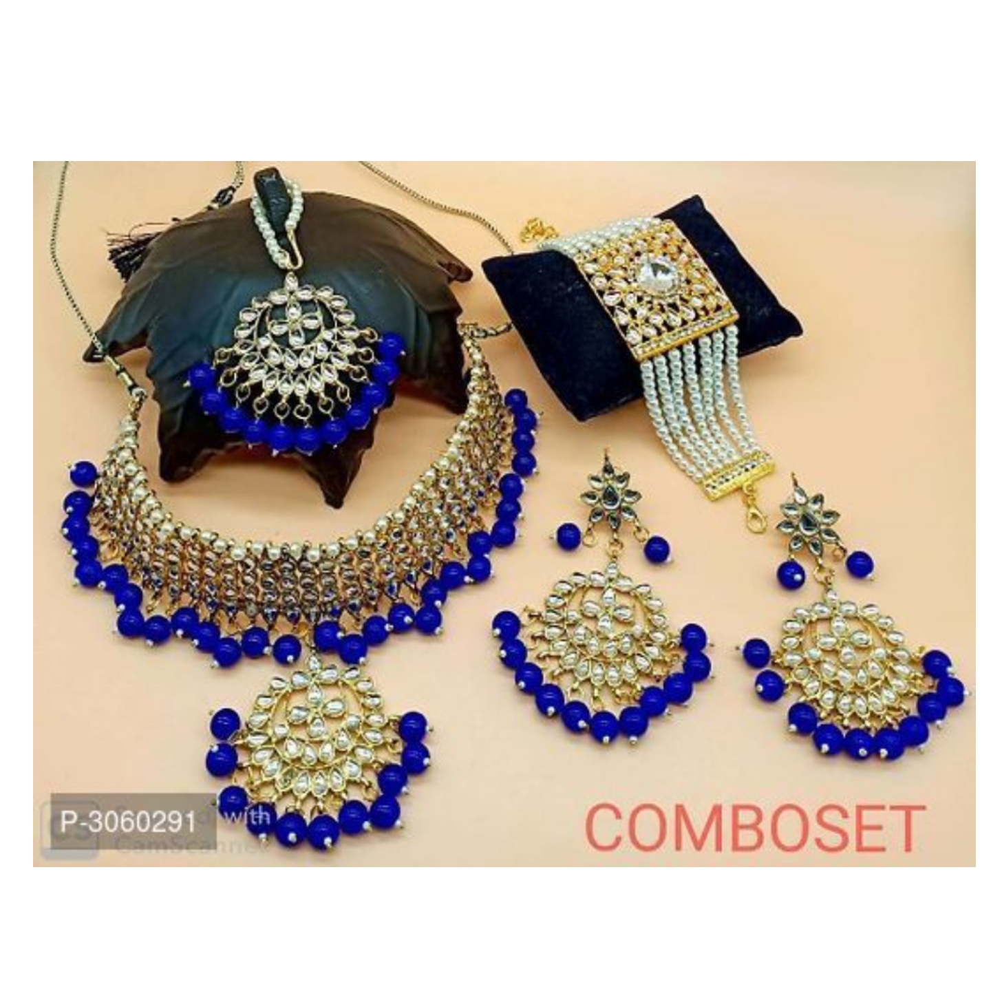 Designer Pearl Kundan Jewellery Combo Including Pair Of Earring and Maang Tikka and Bracelet