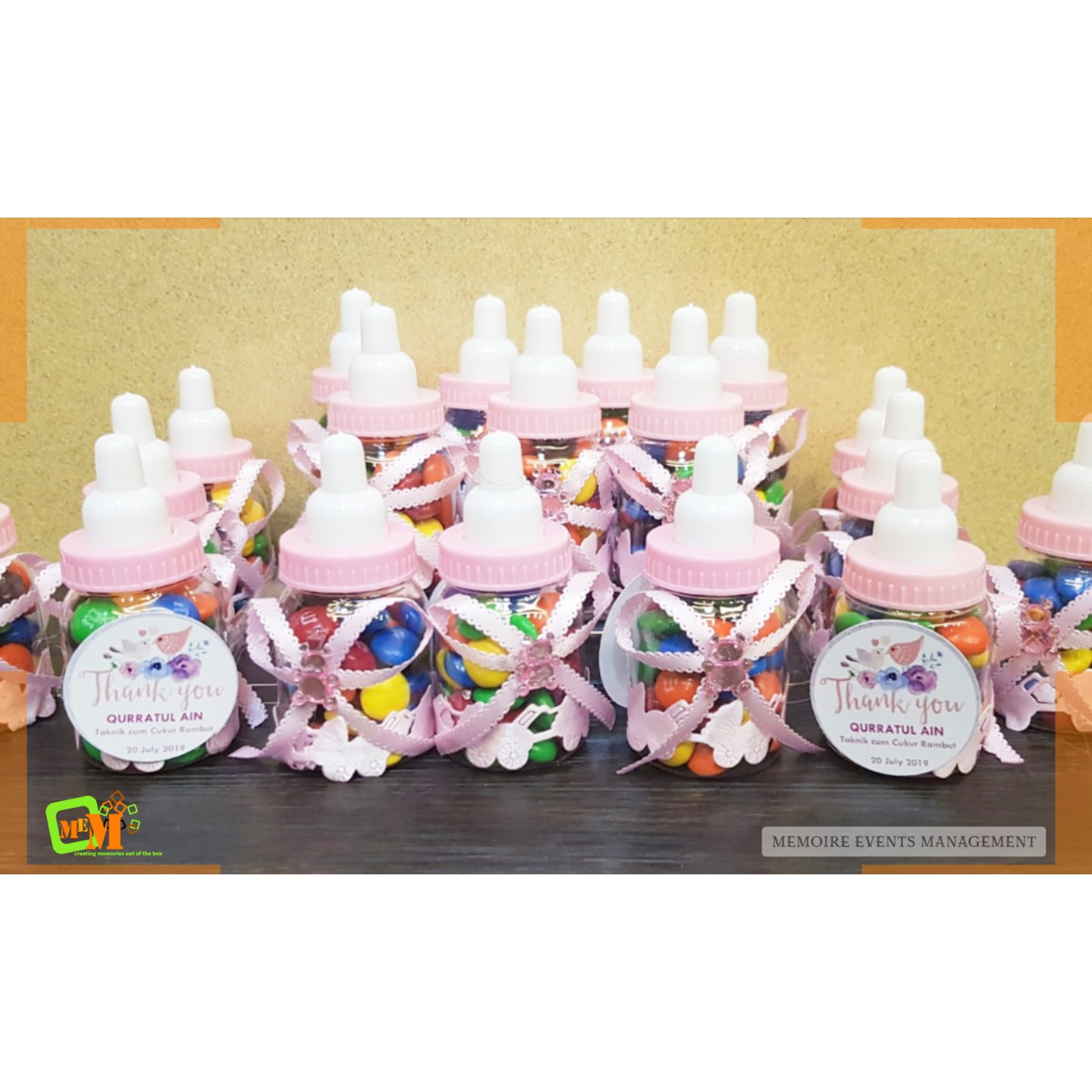 Mini Baby Bottles with Chocolate Buttons