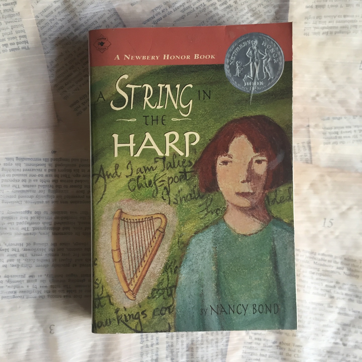 A String in the Harp by Nancy Bond [Paperback]