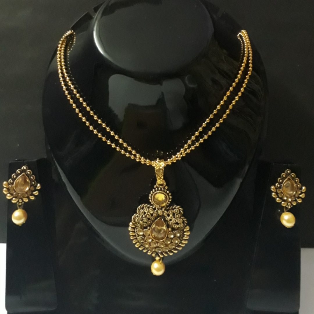 Traditional stone Made Gold plated pendant necklace earring set pearl string for girls party wear jewelry