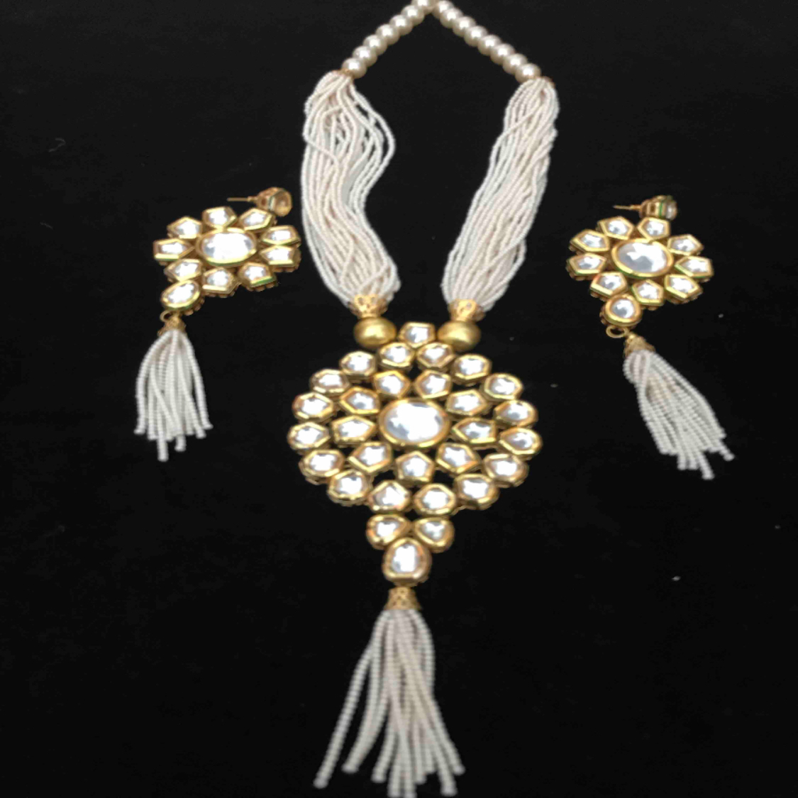 kundan set with multistrand white beads necklace and earrings 