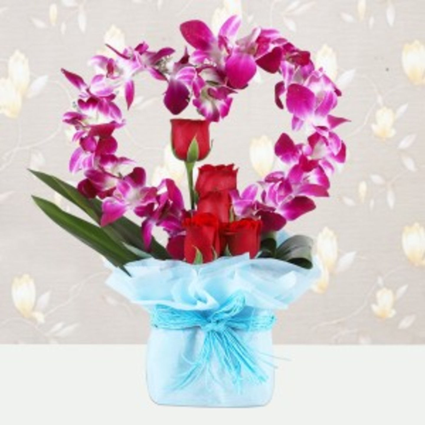 Heart shape Roses and orchid arrangement