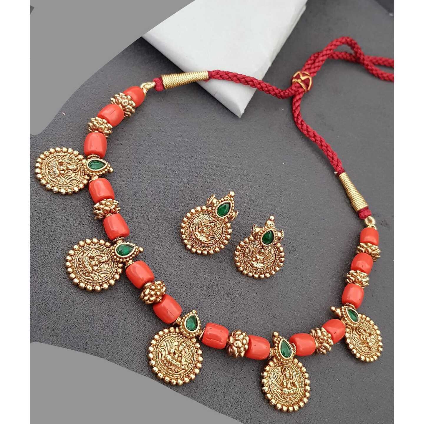 Coral Beads with small Devi  Pendants 