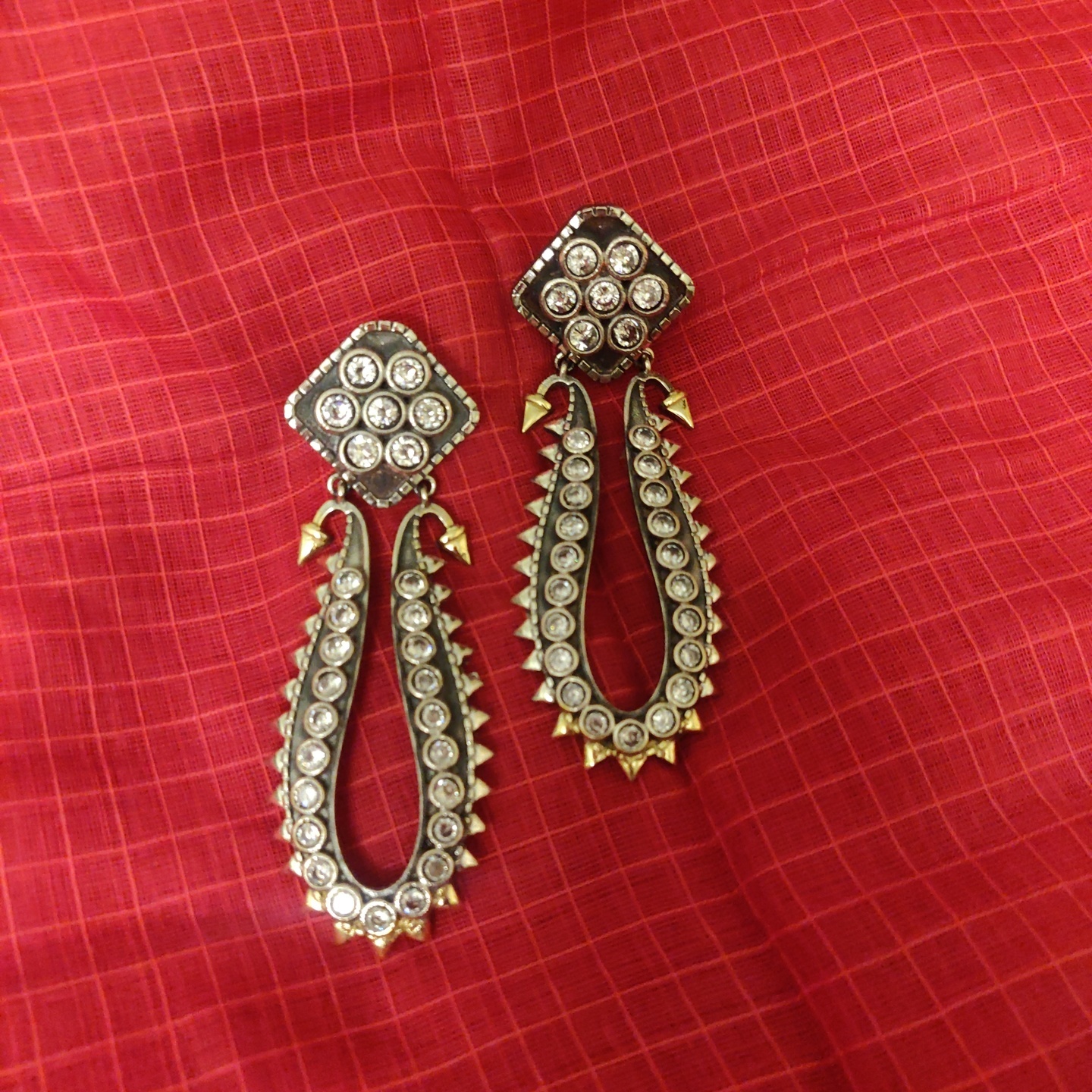 Stone Encrusted Dual Tone Earrings in Brass
