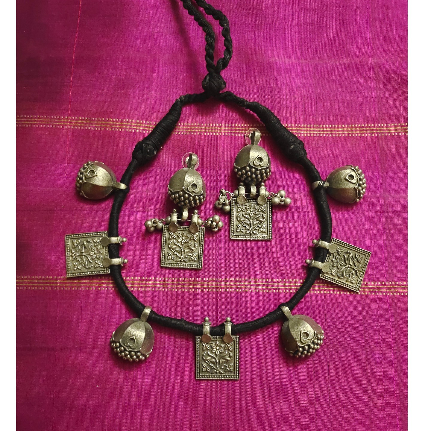 Tribal charms on Dori