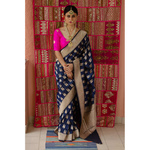 Handllom cutwork katan Banarasi silk saree with woven motifs.