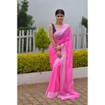 Handwoven chiffon banarasi saree with handwoven silver jari motifs.