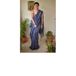 Handwoven linen saree with woven embroidered border