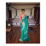 Handwoven chiffon banarasi saree with handwoven silver jari motifs.