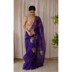 Handloom handembroidered organza resham silk saree enhanced with zari scallops.