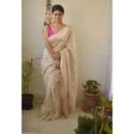 Handwoven katan silk banarasi saree with handwoven motifs.