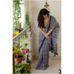 Hand block printed natural dyed kota doria saree with natural dyed Ajrakh patch work border and tassel.