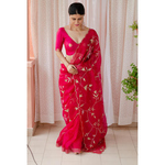 Handloom handembroidered organza silk saree enhanced with beads and zari scallops.
