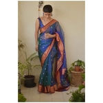 Handwoven Chanderi silk saree with meena bootis motif and handwoven border.