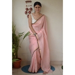 Handwoven jamdani linen saree.