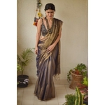 Handwoven metallic linen saree.