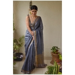 Handwoven linen by linen saree with jari pallu.