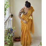 Handwoven metallic linen saree.