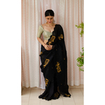 Handloom handembroidered organza resham silk saree enhanced with resham thread scallops.