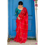 Handloom handembroidered organza resham silk saree enhanced with zari scallops.