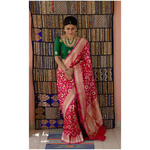 Handloom Katan Banarasi silk saree with woven motifs.