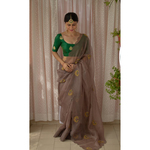 Handloom handembroidered organza resham silk saree enhanced with resham thread scallops.