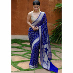 Handloom chiffon khaddi banarasi saree with silver jari booti.