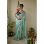 Handwoven linen by linen saree with jari pallu.