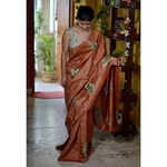 Handwoven and hand embroidered tussar silk saree.