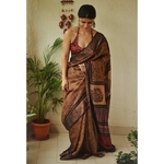Handwoven and handblock printed tussar silk saree.