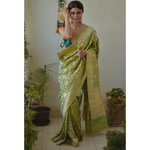 Handwoven katan silk banarasi saree with handwoven motifs.