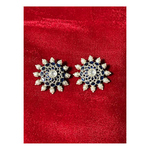 Handmade silver peral and stone studs.