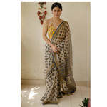 Hand block printed and natural dyed kota doria saree with natural dyed Ajrakh patch work border and tassel.